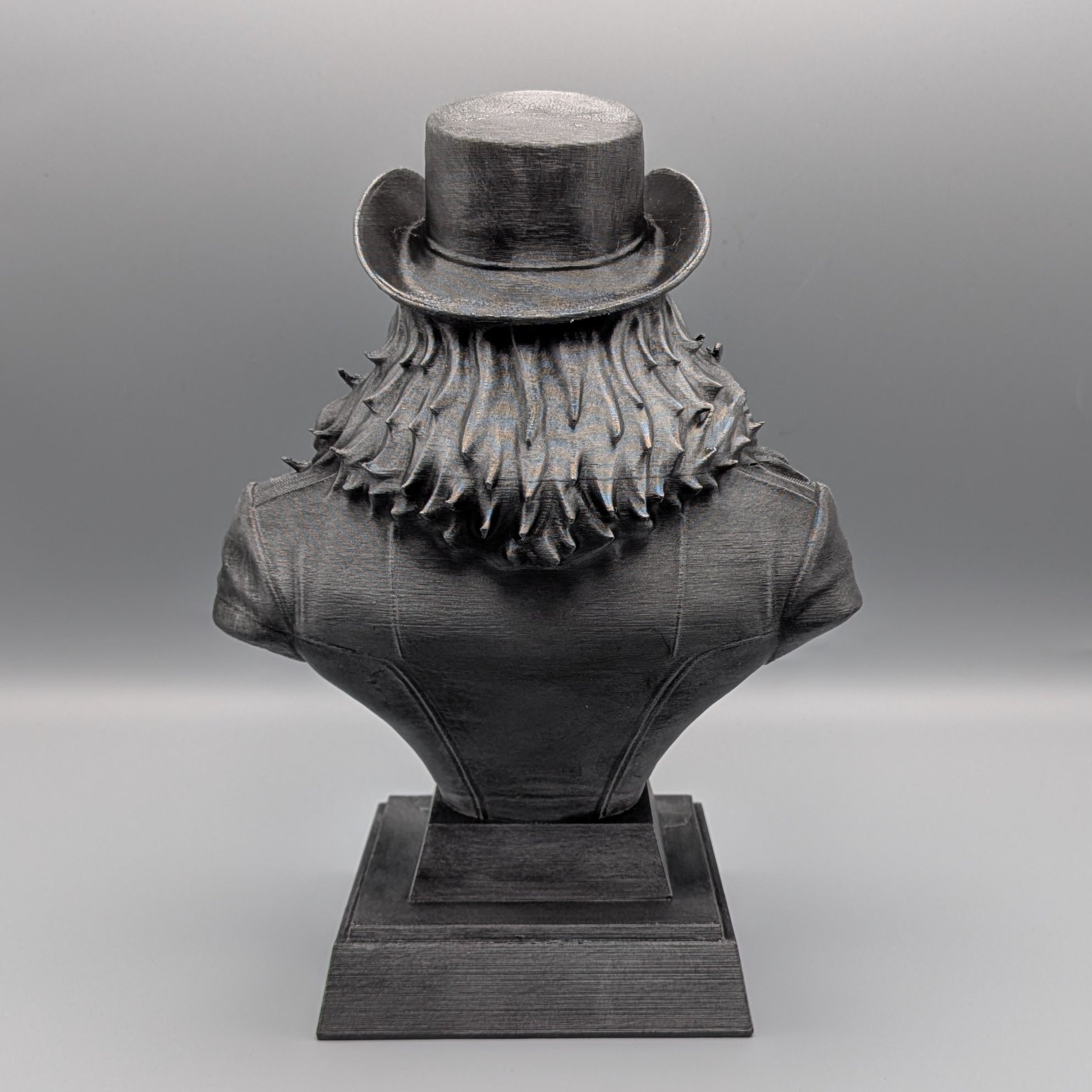 Rock tribute bust on pedestal base black and silver