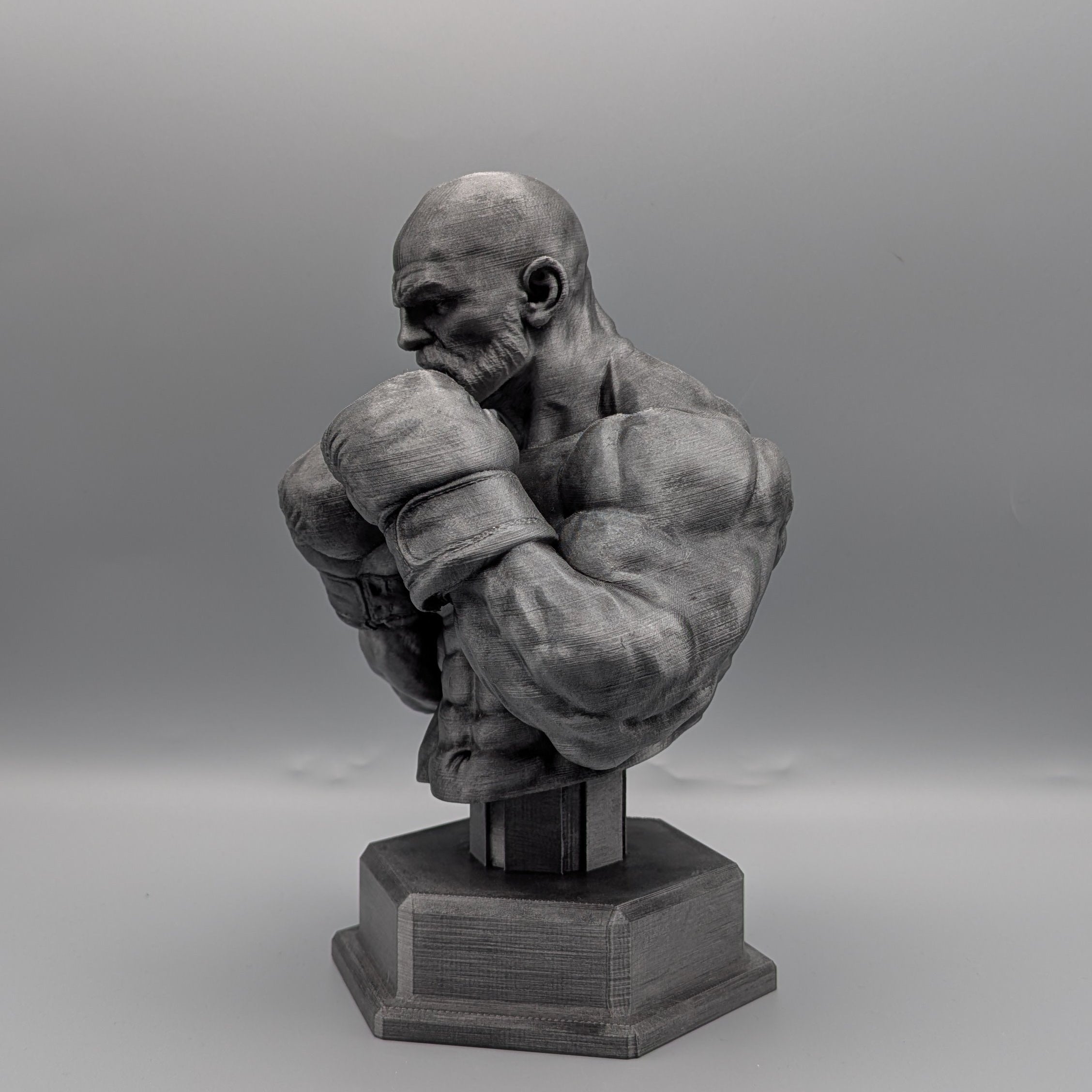 Heavyweight boxer bust angled view highlighting fighter posture and form