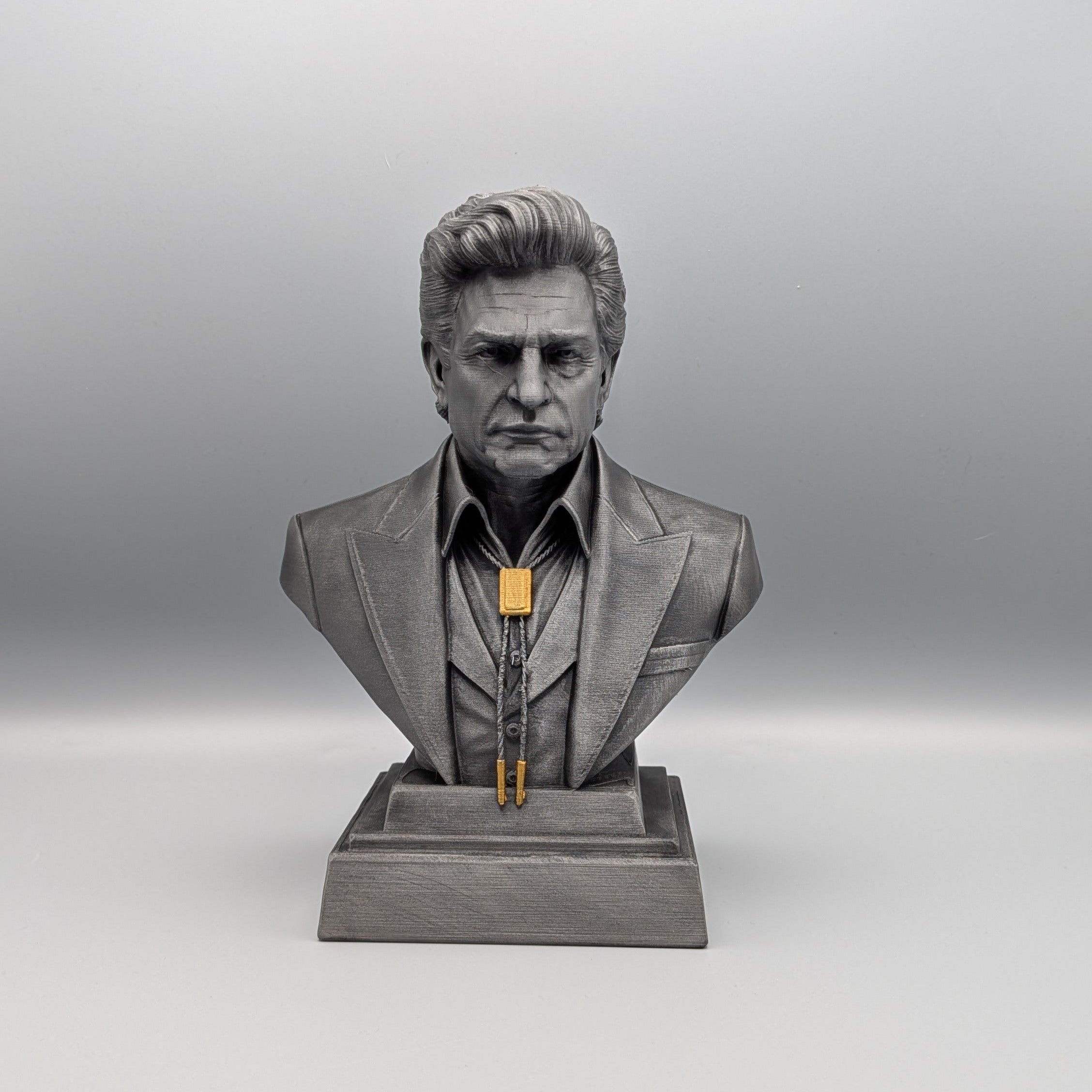 Johnny Cash bust front view showing iconic facial features and silhouette