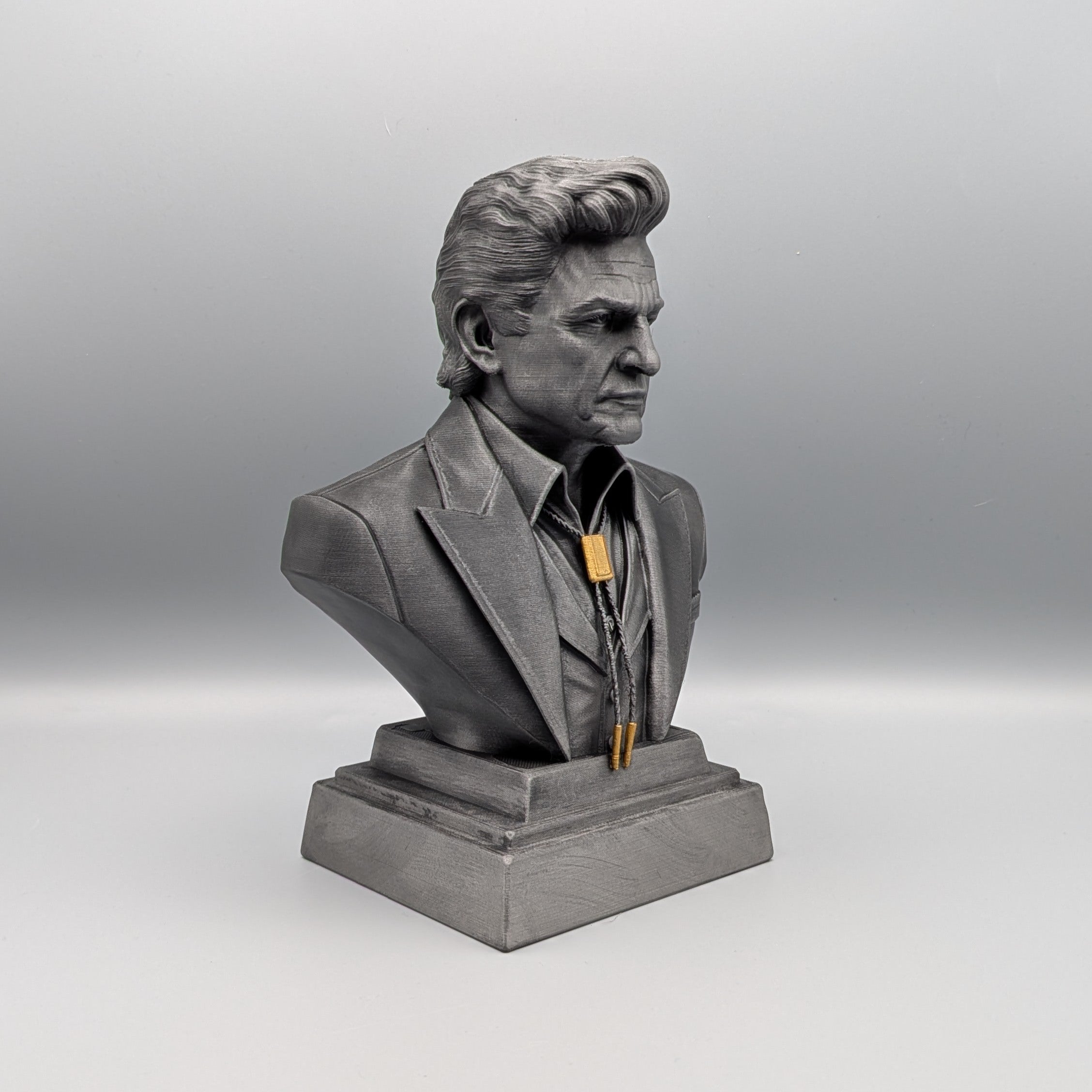 Johnny Cash bust side view showing iconic profile and hairstyle