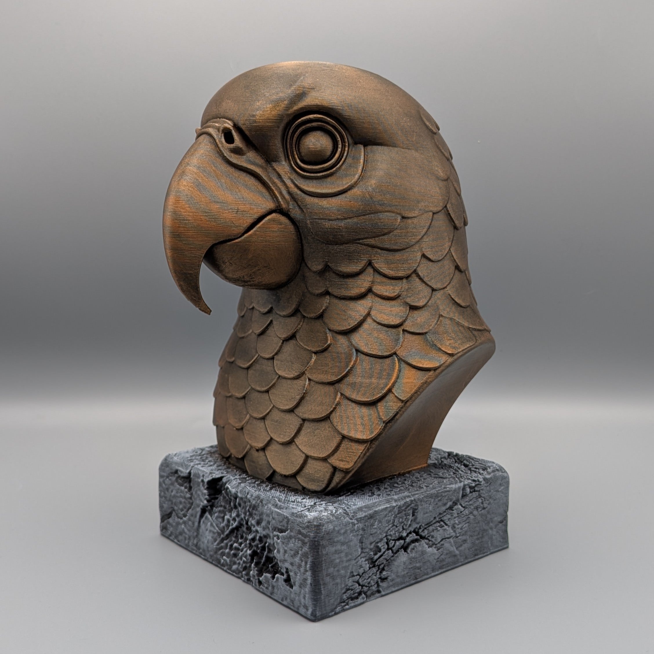 Parrot bust angled view showing depth and sculpted feather detail