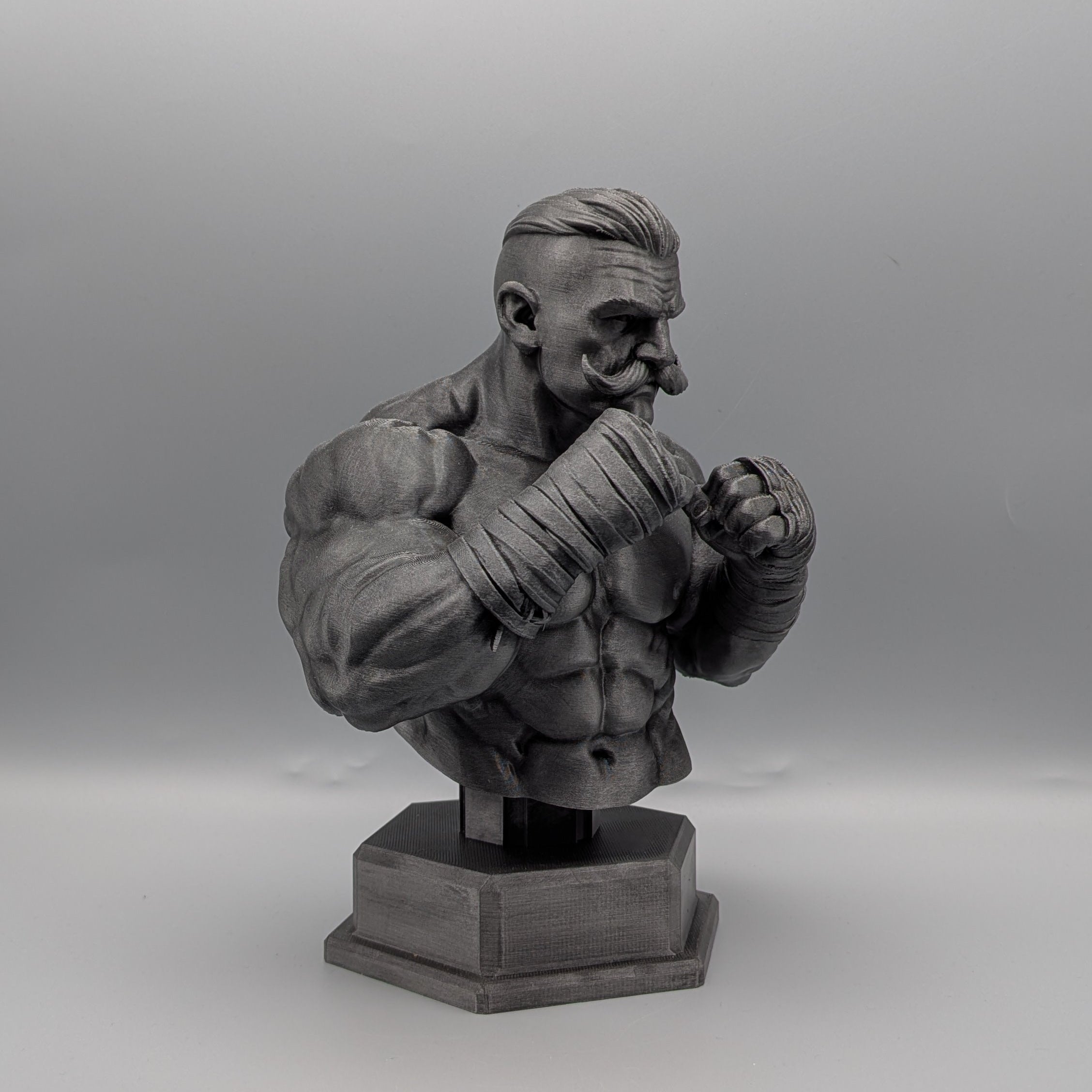 Pugilist boxer bust side view showing fighter details
