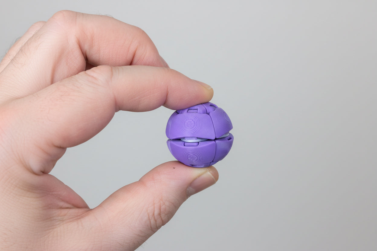 Zorble fidget toy in round shape with smooth design